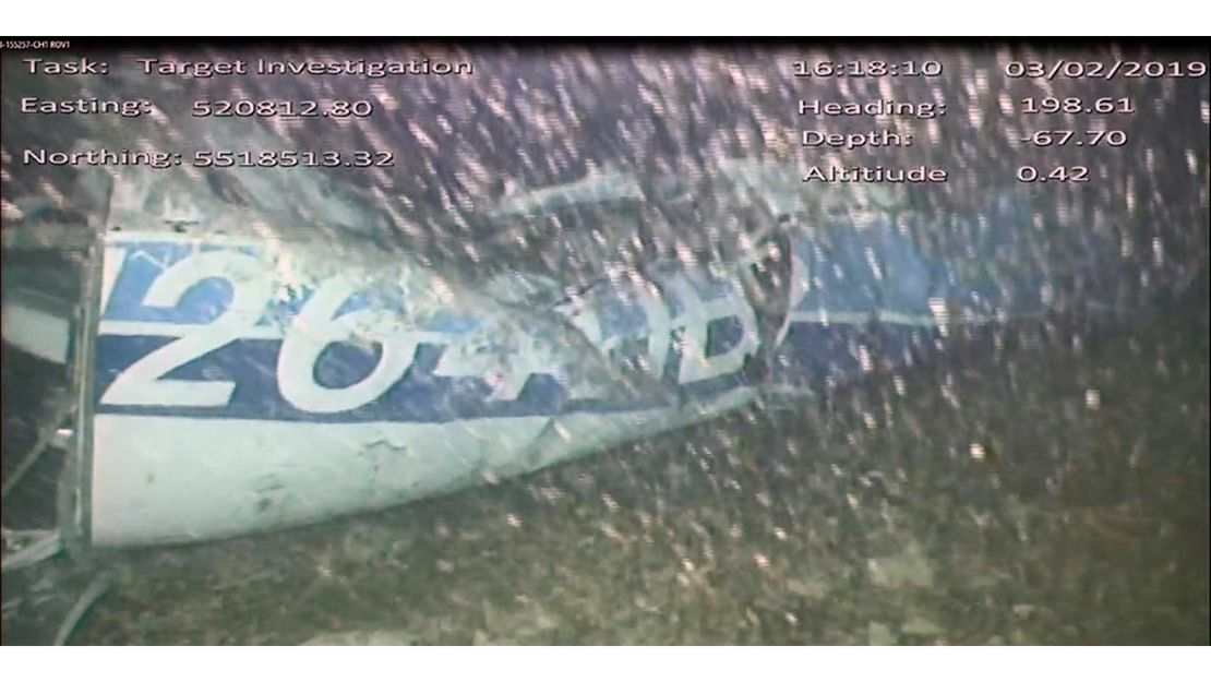 An image released Monday Feb. 4 by the UK Air Accidents Investigation Branch (AAIB) showing the rear left side of the fuselage including part of the aircraft registration N264DB