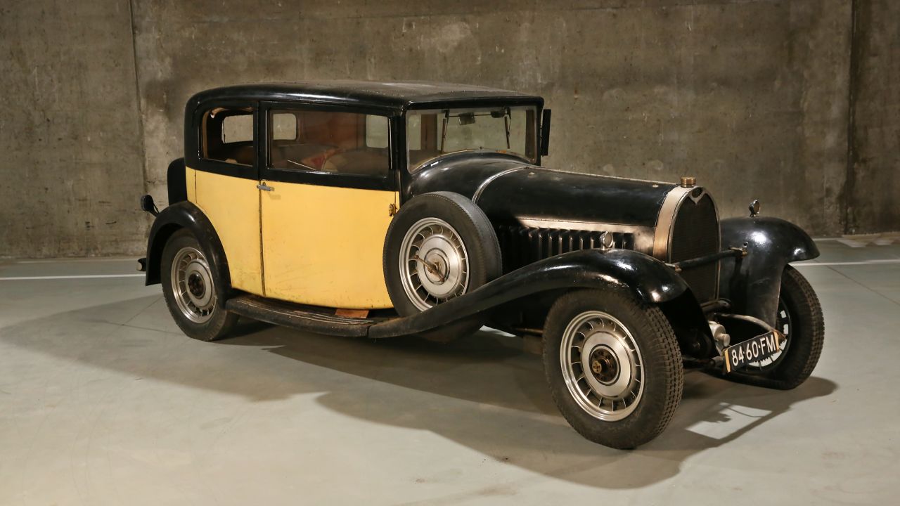 The yellow and black 1923 Type 49 Berline.