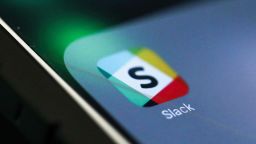 The icon for the chat service app Slack, by Slack Technologies Inc., sits on the screen of an Apple Inc. iPhone 6 smartphone in this arranged photograph in London, U.K., on Monday, Sept. 18, 2017. Slack closed a $250 million funding round led by SoftBank Group Corp.s Vision Fund, the company said Sunday. Photographer: Chris Ratcliffe/Bloomberg via Getty Images