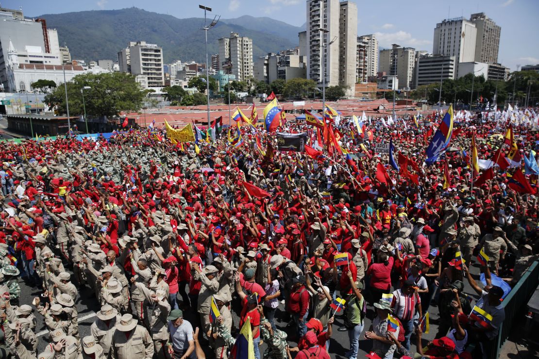 Thousands of public employees and government supporters gather in Caracas, Venezuela, Saturday, Feb. 2, 2019. 