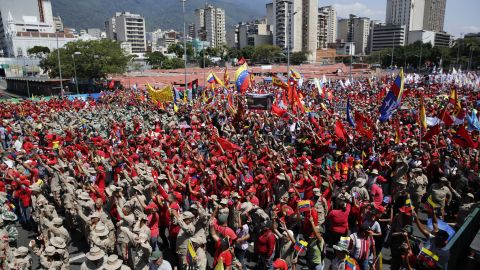 Thousands of public employees and government supporters gather in Caracas, Venezuela, Saturday, Feb. 2, 2019.