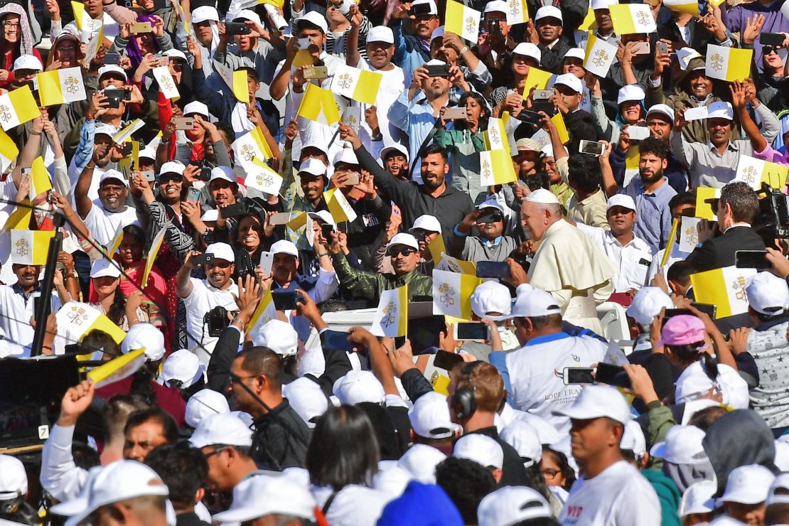 Pope Francis greets crowds as he arrives Tuesday.