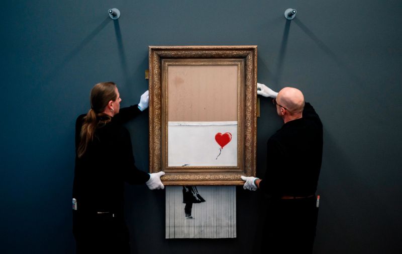 Banksy s self shredding painting goes on display CNN