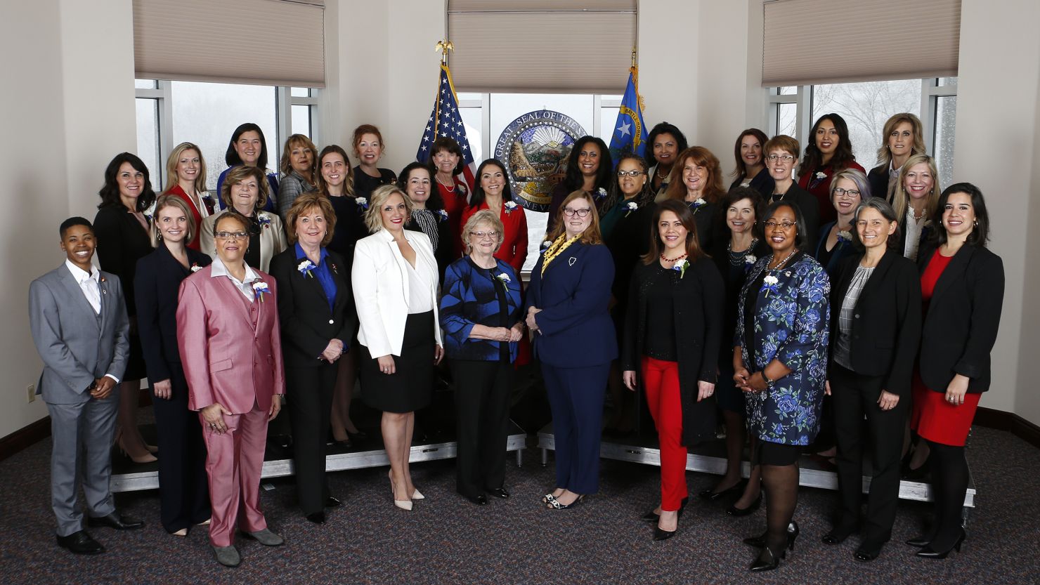 Thirty-two female members of the Nevada Legislature pose before the start of the state's legislative session in Carson City on Monday. The group represents the first female-majority legislature in the country. 