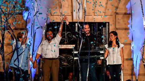 Bukele, his wife Gabriela Rodriguez, and vice president Felix Ulloa celebrate after winning the presidential elections.