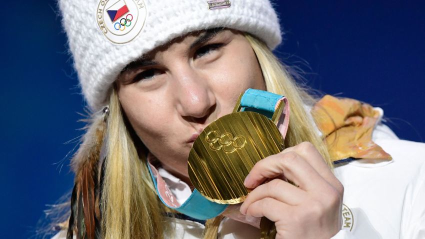 TOPSHOT - Czech Republic's gold medallist Ester Ledecka kisses her medal on the podium during the medal ceremony for the alpine skiing women's Super-G at the Pyeongchang Medals Plaza during the Pyeongchang 2018 Winter Olympic Games in Pyeongchang on February 17, 2018. / AFP PHOTO / JAVIER SORIANO        (Photo credit should read JAVIER SORIANO/AFP/Getty Images)