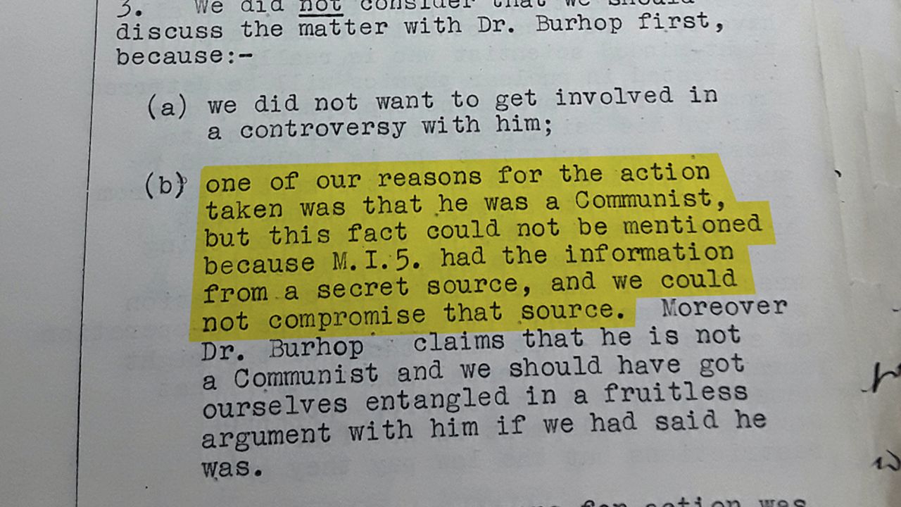 A top-secret British government file on Eric Burhop, recording information from MI5 which said he was a secret Communist. Original image altered for clarity.