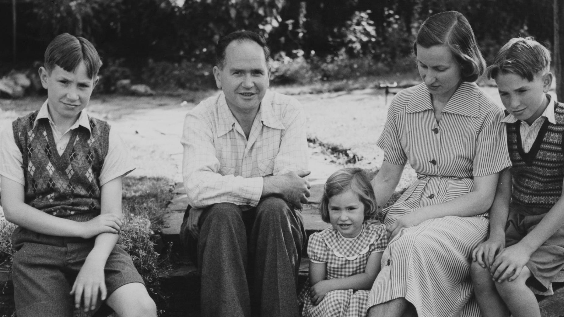 Australian physicist Eric Burhop (center), with his family at their home in Surbiton, London, 22nd July 1951. Burhop's passport was canceled by the British government over plans to travel to the Soviet Union.
