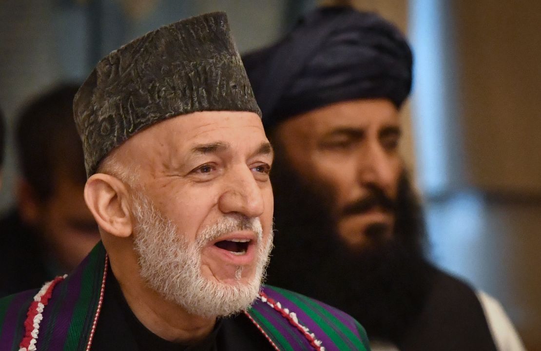 Former Afghan President Hamid Karzai attends the opening Tuesday of the two-day talks in Moscow.