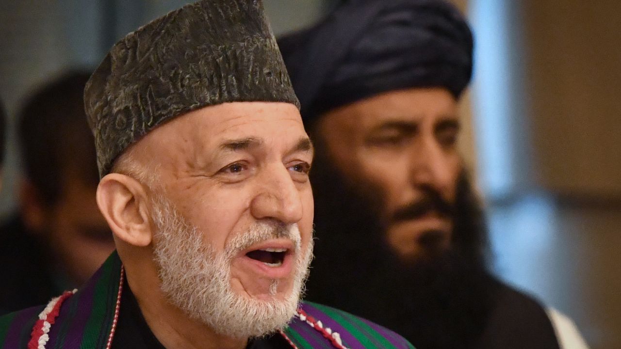 Former Afghan President Hamid Karzai attends the opening Tuesday of the two-day talks in Moscow.