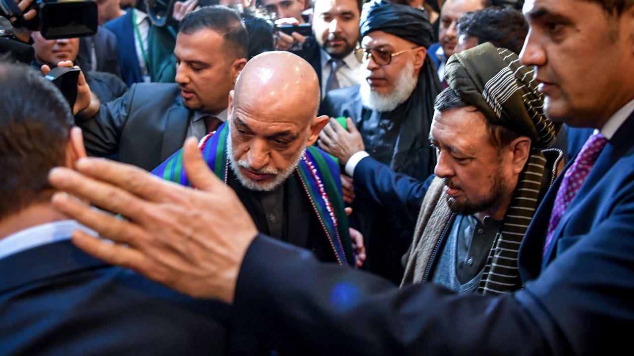 Former Afghan president Hamid Karzai arrives at the Moscow conference Tuesday. 