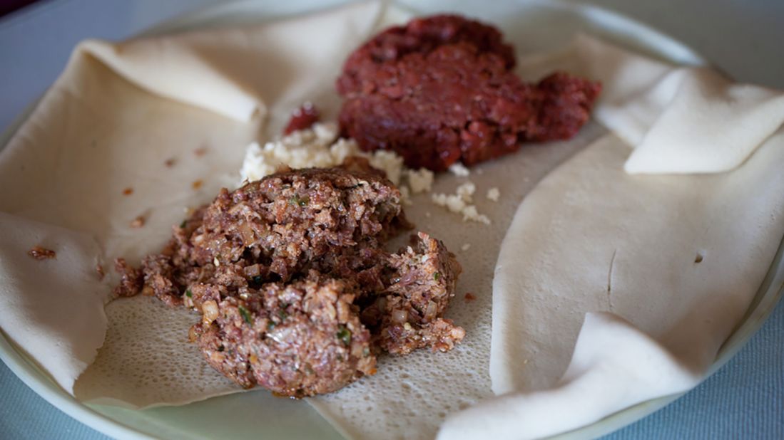 <strong>Dulet:</strong> Dulet (pictured front) is made with minced tripe, liver and lean beef. Like kitfo (pictured back), it's filling and satisfying.  
