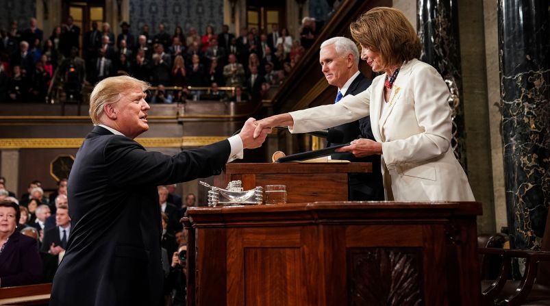 President Donald Trump shakes hands with House Speaker Nancy Pelosi before delivering his State of the Union address on Tuesday, February 5.