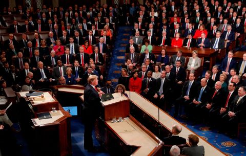 Trump faces lawmakers as he begins his speech in the House chamber.