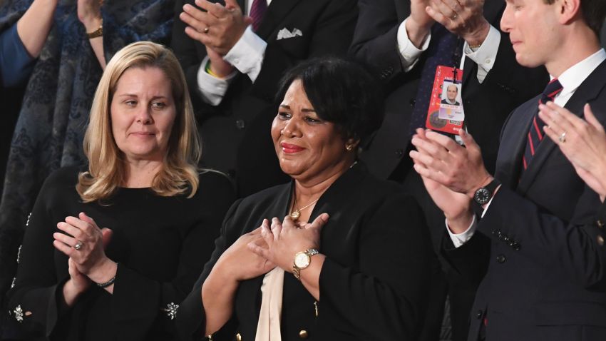 Alice Johnson (C), one of the US President's special guests, reacts as the president acknowledges her during his State of the Union address at the US Capitol in Washington, DC, on February 5, 2019. (Photo by SAUL LOEB / AFP)        (Photo credit should read SAUL LOEB/AFP/Getty Images)