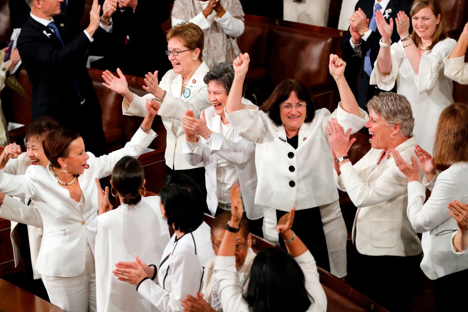 A group of Democratic women, dressed in all white, stands to cheer during a portion of Trump's speech. Trump was discussing women in the workforce when <a href="index.php?page=&url=https%3A%2F%2Fwww.cnn.com%2Fpolitics%2Flive-news%2Fstate-of-the-union-2019%2Fh_4e680e5b1a294458eaa78e48699aff82" target="_blank">the moment</a> happened. "No one has benefited more from a thriving economy than women who have filled 58% of the newly created jobs last year," Trump said. After the Democrats stood up, Trump joked: "You weren't supposed to do that. Thank you very much." The House Democratic Women's Working Group had invited female members of both parties to wear white<a href="index.php?page=&url=https%3A%2F%2Fwww.cnn.com%2Fpolitics%2Flive-news%2Fstate-of-the-union-2019%2Fh_478ac94322e9c1323a7b902ba3b5e0a2" target="_blank"> as a symbol of solidarity.</a>
