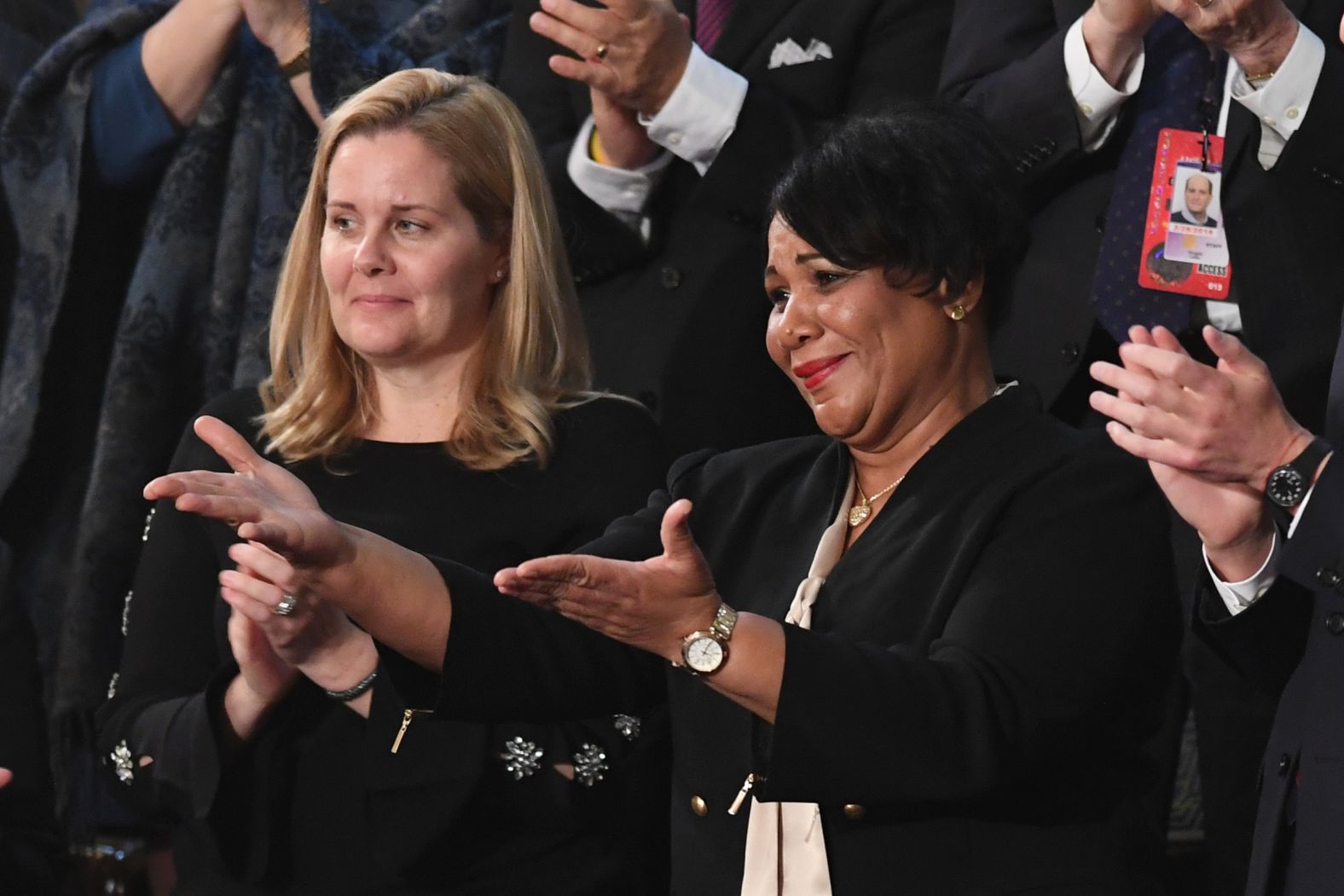 Alice Johnson, one of the President's <a href="index.php?page=&url=https%3A%2F%2Fwww.cnn.com%2F2019%2F02%2F04%2Fpolitics%2Ftrump-state-of-the-union-guests%2Findex.html" target="_blank">13 special guests,</a> reacts as Trump <a href="index.php?page=&url=https%3A%2F%2Fwww.cnn.com%2Fpolitics%2Flive-news%2Fstate-of-the-union-2019%2Fh_fa76fc0cda6938147be6b3c597e0a950" target="_blank">acknowledges her during his speech.</a> Johnson, a first-time nonviolent drug offender, had her sentence commuted by Trump following his Oval Office meeting with Kim Kardashian West.