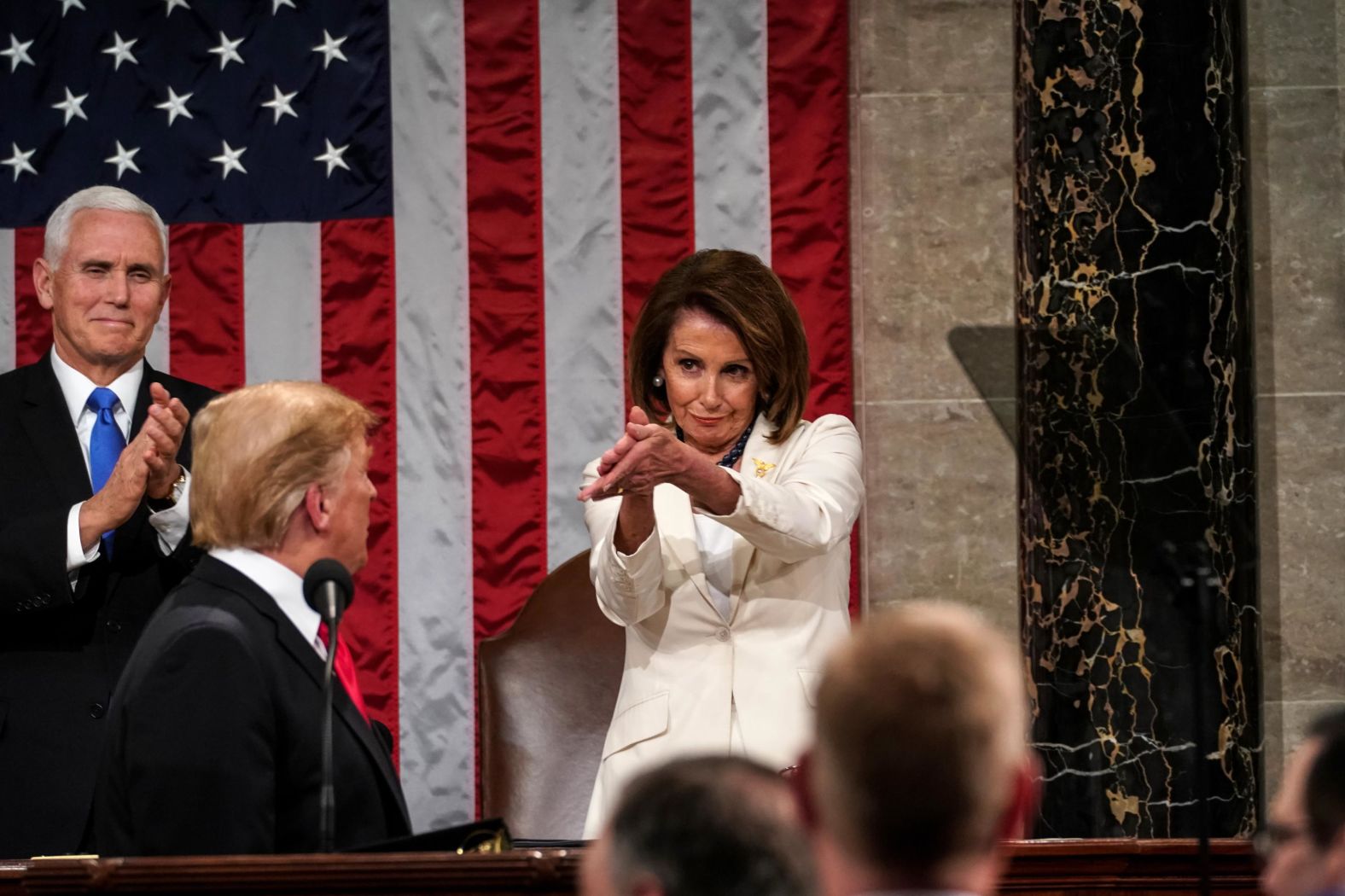 Pelosi and Pence clap during Trump's State of the Union address in February 2019. Because of the record-long government shutdown, <a href="index.php?page=&url=https%3A%2F%2Fwww.cnn.com%2F2019%2F02%2F05%2Fpolitics%2Fgallery%2Fstate-of-the-union-2019%2Findex.html" target="_blank">Trump's speech</a> came a week later than originally planned.