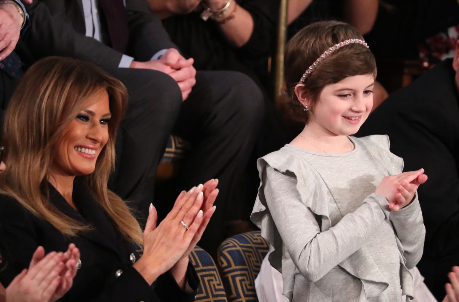 First lady Melania Trump applauds with 10-year-old cancer survivor Grace Eline as <a href="index.php?page=&url=https%3A%2F%2Fwww.cnn.com%2Fpolitics%2Flive-news%2Fstate-of-the-union-2019%2Fh_44ad15175e206bbae81d5b6bb9d47ac2" target="_blank">Trump mentions Grace</a> during his speech. Grace was 9 when she was diagnosed with germinoma, a type of brain cancer. "At the same time, she rallied her community and raised more than $40,000 for the fight against cancer," Trump said. The White House said Grace recently finished chemotherapy and today shows no evidence of the disease.