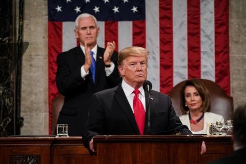 Pence applauses part of Trump's speech while Pelosi remains sitting.
