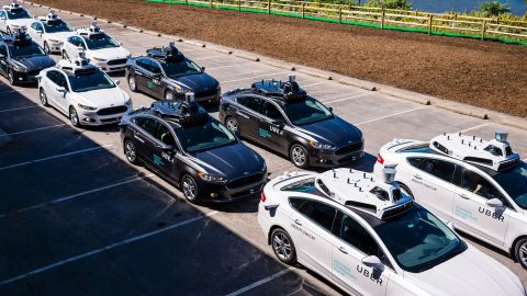 Pilot models of the Uber self-driving car on display in 2016.
