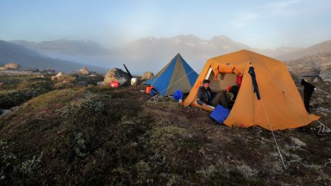Lasher rests in his tent in the team's camp in southern Greenland.