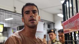 TOPSHOT - Hakeem al-Araibi, a Bahraini refugee and Australian resident, is escorted to a courtroom in Bangkok on February 4, 2019. - Hakeem al-Araibi, who was detained by Thai immigration authorities in late November 2018 after arriving in Bangkok for a vacation with his wife, fears torture and even death if he is returned to his homeland. (Photo by Lillian SUWANRUMPHA / AFP)        (Photo credit should read LILLIAN SUWANRUMPHA/AFP/Getty Images)