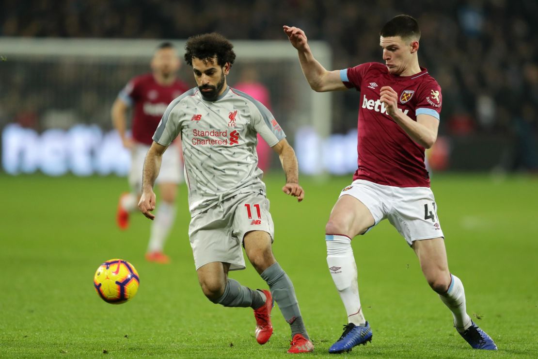 Salah battles for possession with West Ham's Declan Rice.