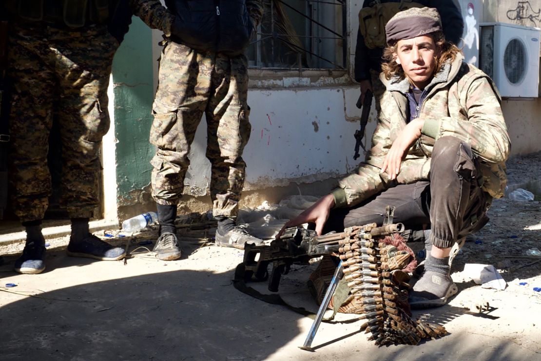 Arab fighters from the  Shuaitat tribe take positions around ISIS's last stronghold in eastern Syria.