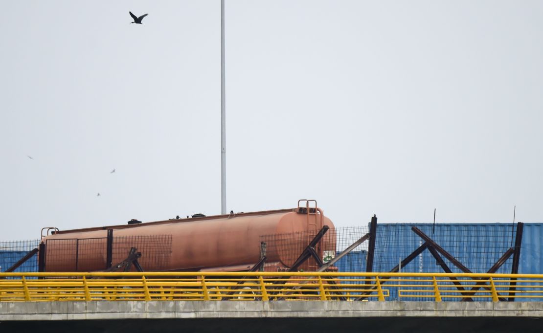 An oil tanker and two large containers blocked passage across the Tienditas Bridge on Wednesday. 