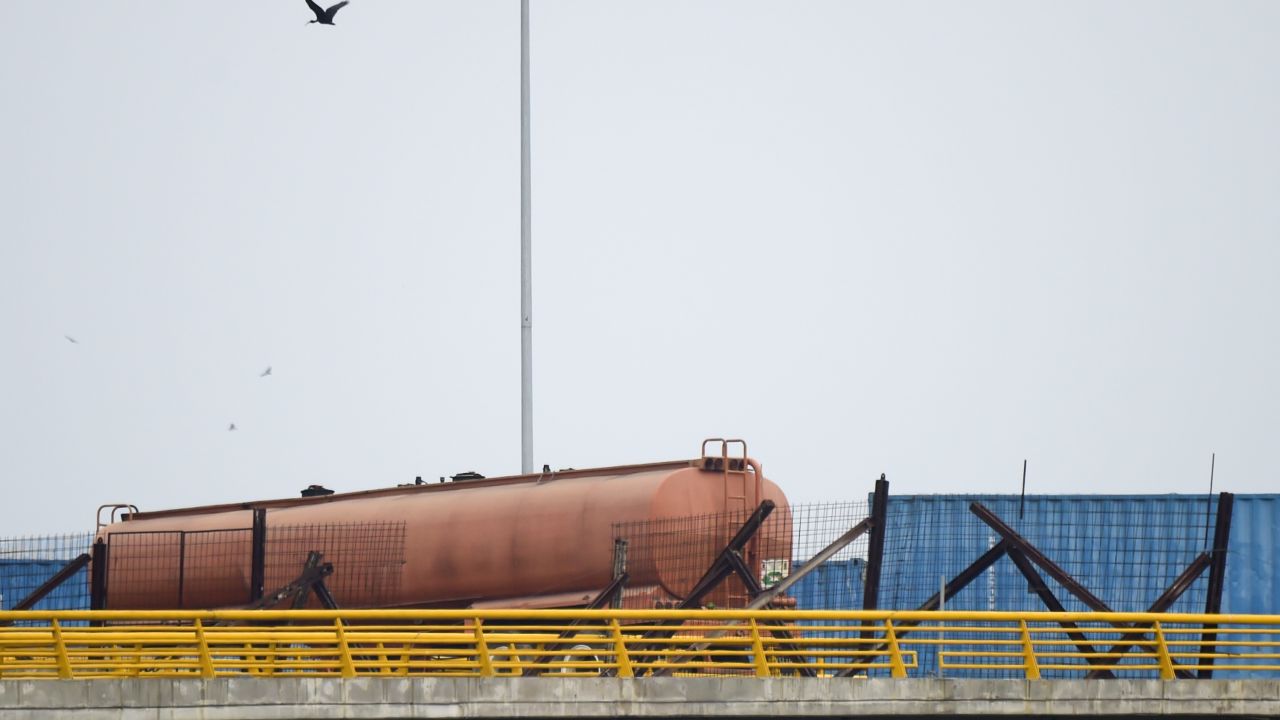 An oil tanker and two large containers blocked passage across the Tienditas Bridge on Wednesday.