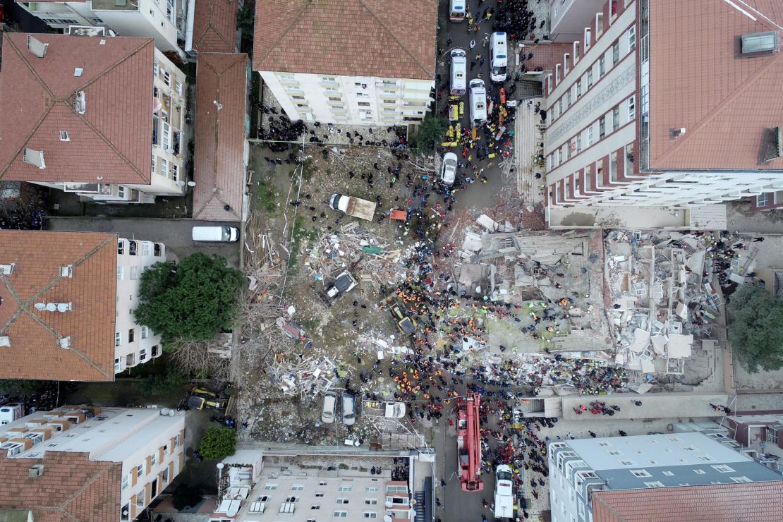 A drone photo shows the rescue operation underway after the building in an eastern district of Istanbul collapsed Wednesday.