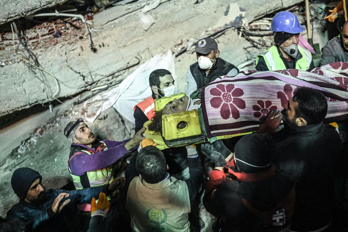 A woman is rescued from the rubble of a building that collapsed in Istanbul's Maltepe district on Wednesday. 