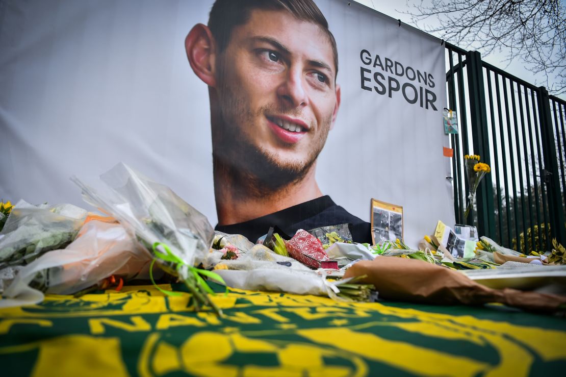 A picture shows flowers put in front of the entrance of the Nantes training on January 25, 2019, four days after the plane of Argentinian forward Emiliano Sala vanished.