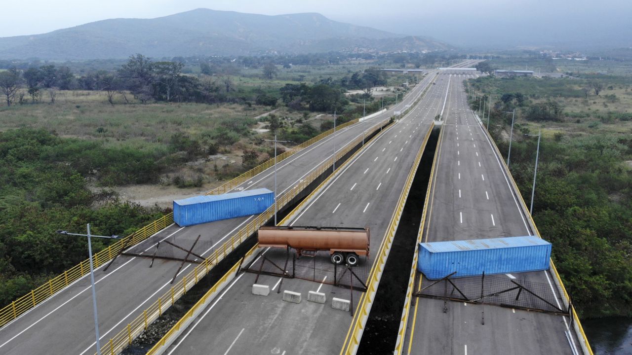 Aerial view of the Tienditas Bridge, in the border between Cucuta, Colombia and Tachira, Venezuela, after Venezuelan military forces blocked it with containers on February 6, 2019. - Venezuelan military officers blocked a bridge on the border with Colombia ahead of an anticipated humanitarian aid shipment, as opposition leader Juan Guaido stepped up his challenge to President Nicolas Maduro's authority. (Photo by EDINSON ESTUPINAN / AFP)        (Photo credit should read EDINSON ESTUPINAN/AFP/Getty Images)