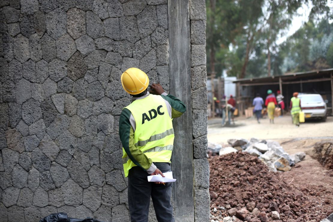 Victor Iyakaremye at the construction site of Ruhehe Primary School.
