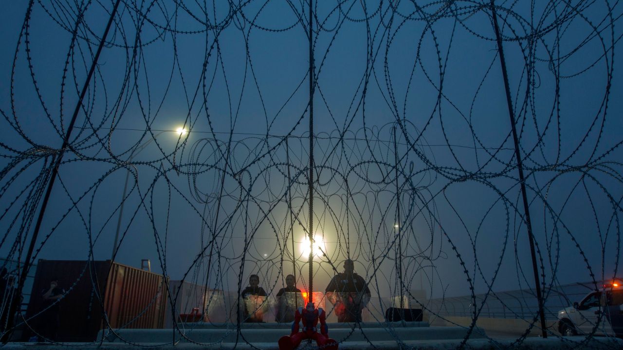 A toy is seen from Piedras Negras, Coahuila state, Mexico as members of the US Border Police guard the international bridge in Texas, on February 6, 2019. -  (Photo by Julio Cesar AGUILAR / AFP) 