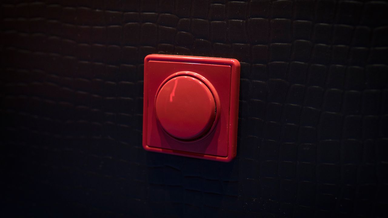 A panic button in a room at My Red Light brothel.