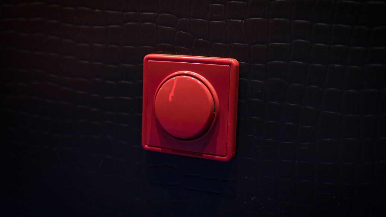 A panic button in a room at My Red Light brothel.