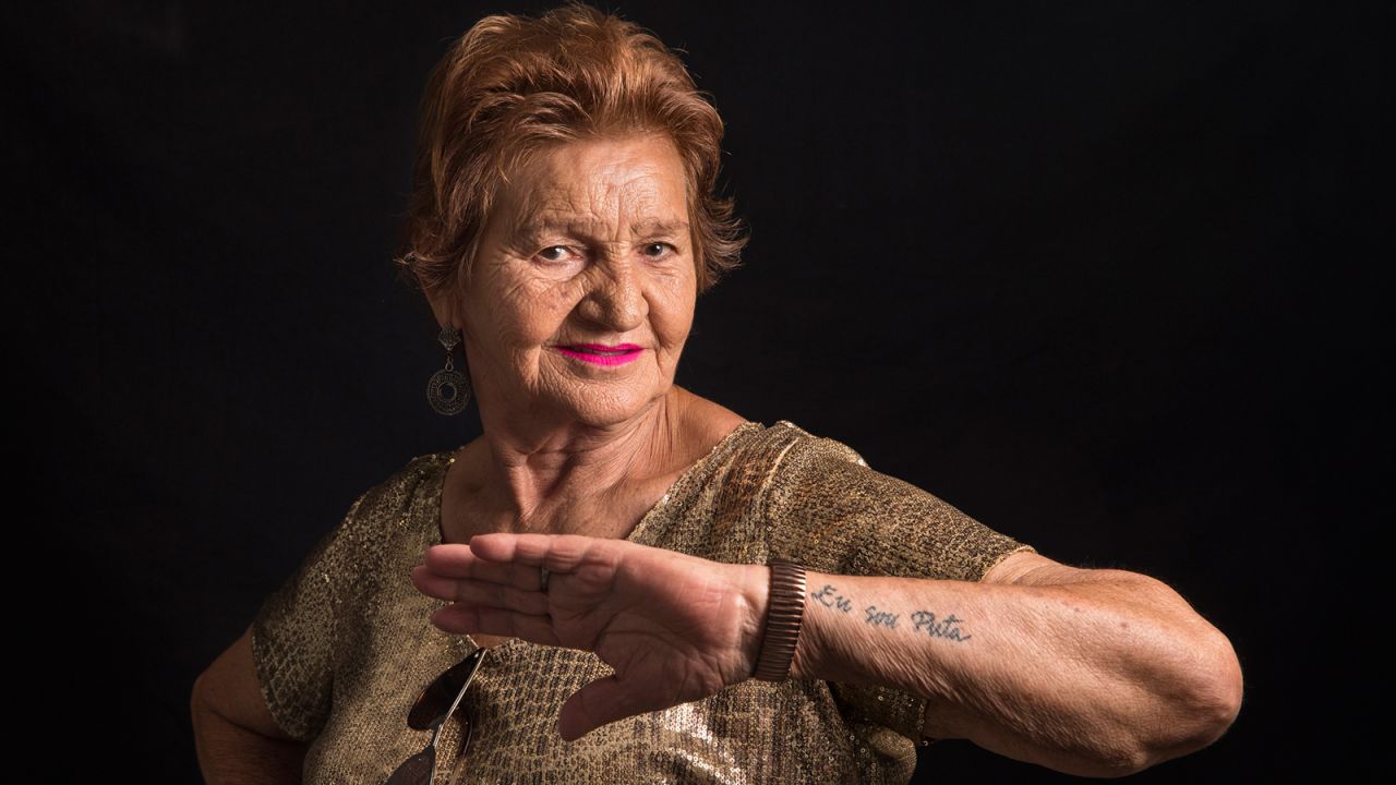 Maria De Lourdes Araujo, 76, of Barreto, Brazil, shows off her "I am a whore" tattoo. The sex work industry used to be filled with passion and glamour, she says, with dancing often used as a means of seduction. Today, the great-grandmother continues to see regular clients.<br />