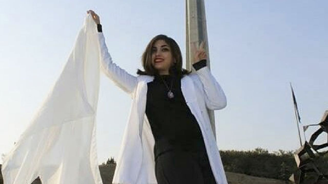 Women in Iran have been protesting the obligatory Islamic headscarf by taking theirs off and waving them on sticks. 