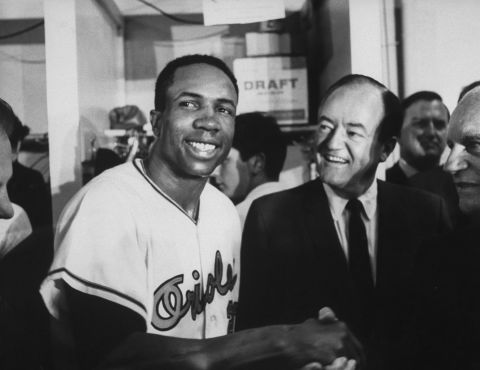 Robinson is congratulated by Vice President Hubert H. Humphrey after the Orioles won the World Series.