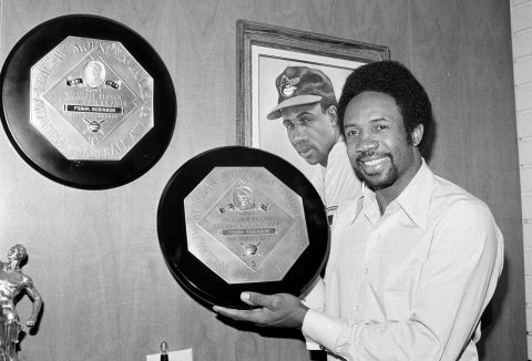 Robinson shows off his MVP awards in 1971. He was the first player to win MVP in both the American and National League.