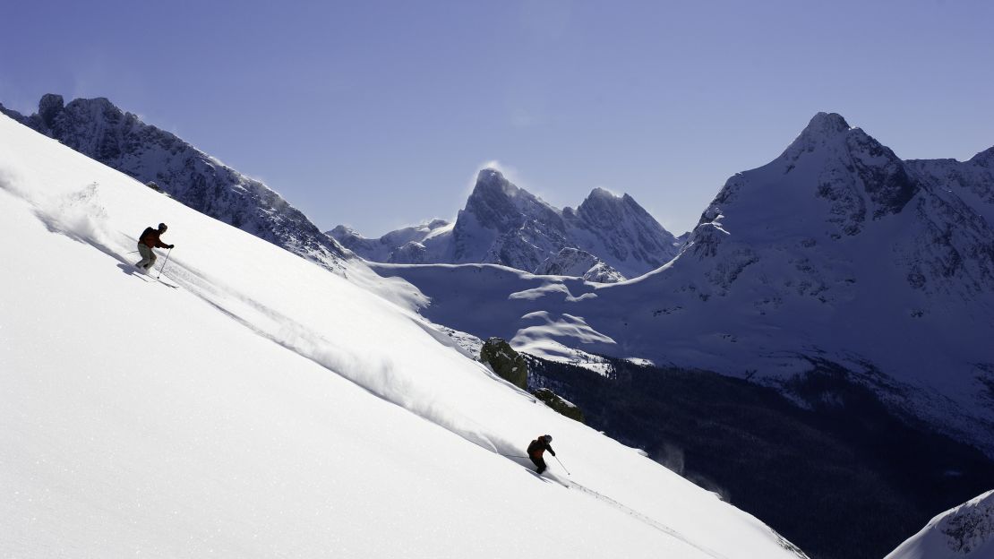 Adventurous skiers experiencing some of the 73,333 acres per person of powder on offer via Bella Coola Heli Sports.  