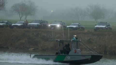 Members of the US Border Police guard the Rio Bravo, natural border between Eagle Pass, Texas and Piedras Negras, Mexico, on Thursday.