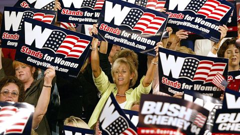 Women cheer on US President George W. Bush as he arrives to deliver remarks on September 17, 2004, during a "Focus On Women's Issues" event in Charlotte, North Carolina.