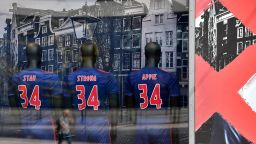 This picture shows puppets in a fanshop wearing shirts with the number 34 of Ajax midfielder Abdelhak Nouri reading "Stay strong Appie" in Amsterdam on July 22, 2017.
Ajax midfielder Abdelhak Nouri has suffered "serious and permanent" brain damage after collapsing, the Dutch club said on July 13, dashing earlier hopes the promising prospect would make a quick recovery. / AFP PHOTO / TOBIAS SCHWARZ        (Photo credit should read TOBIAS SCHWARZ/AFP/Getty Images)