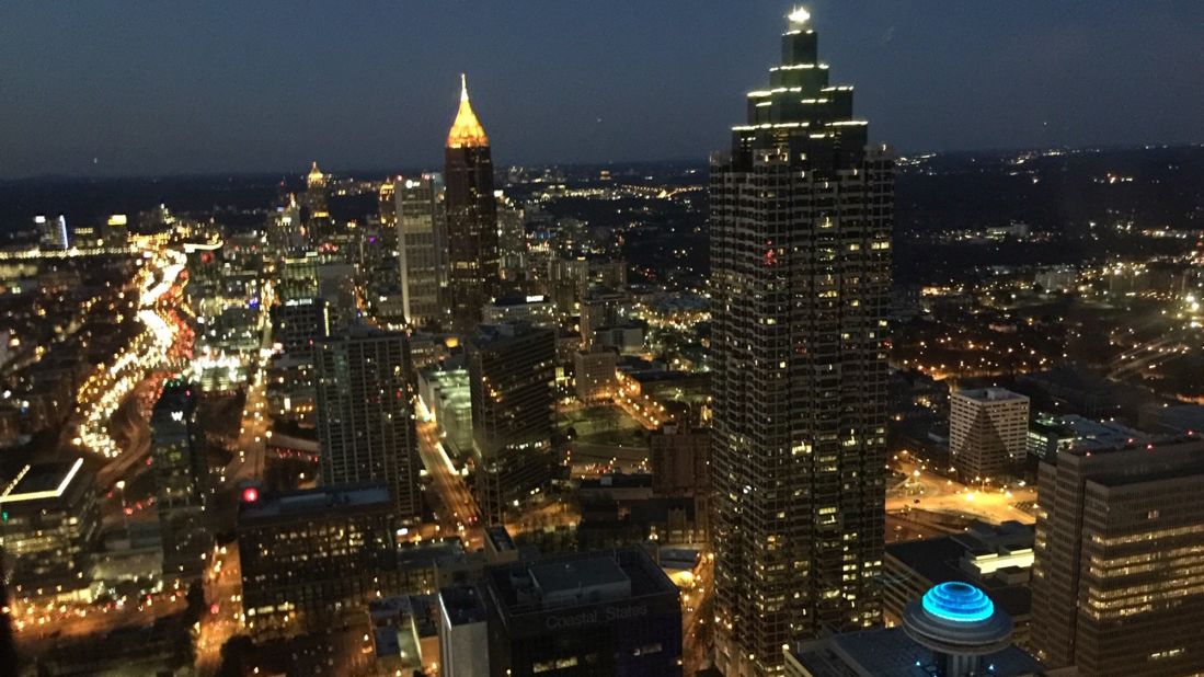 <strong>Do something next door:</strong> A nighttime view of Atlanta, looking toward Midtown, from the observation lounge of the Westin hotel  in downtown on January 26, 2019. Talk about making use of what little time you have -- the hotel is a five-minute walk for me. 