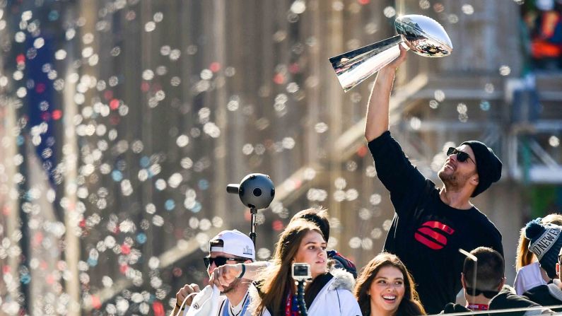 Tom Brady lifts the Lombardi Trophy during the New England Patriots' Super Bowl parade on Tuesday, February 5. Brady has won six Super Bowls as quarterback of the Patriots. No player has won more. <a href="index.php?page=&url=http%3A%2F%2Fwww.cnn.com%2F2015%2F01%2F25%2Fus%2Fgallery%2Fsuper-bowl-superlatives%2Findex.html" target="_blank">Photos: Super Bowl records</a>
