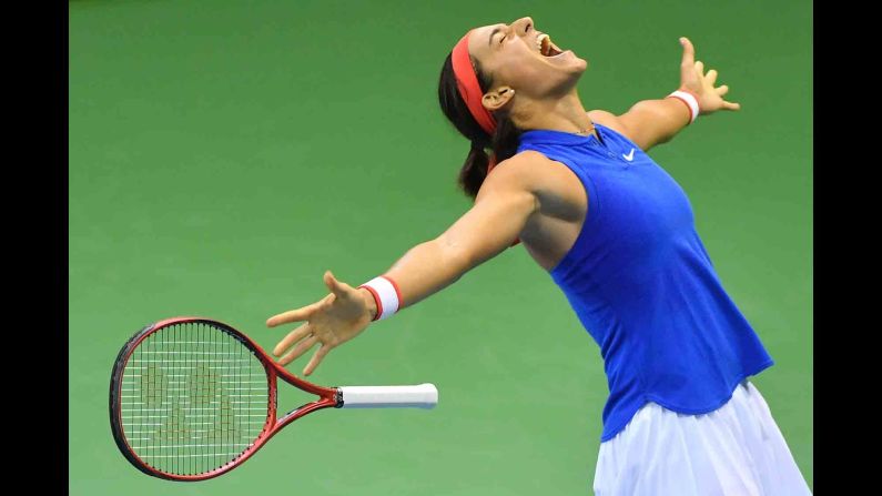 France's Caroline Garcia celebrates after winning her Fed Cup match against Belgium's Elise Mertens on Sunday, February 10. The victory pushed France into the semifinals.